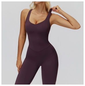 Detail of cross-back yoga jumpsuit featuring deep V-neck and slimming waist stitching