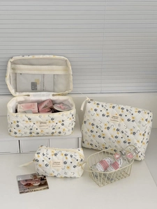 Three-piece floral corduroy cosmetic bag set in almond yellow with quilted cotton finish