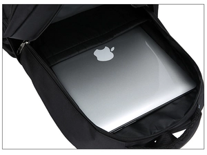 Detail of padded laptop compartment inside black Oxford backpack for 15-inch notebooks