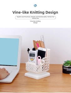 Detail view of white faux-rattan desk organizer with compartments for pens and smartphone