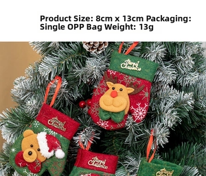 Close-up of festive Christmas glove ornaments with cartoon bear and reindeer on a tree