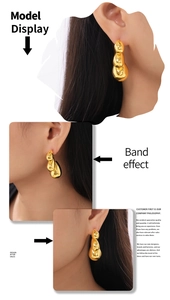 Detailed view of layered teardrop earrings in 18k gold-plated copper on model