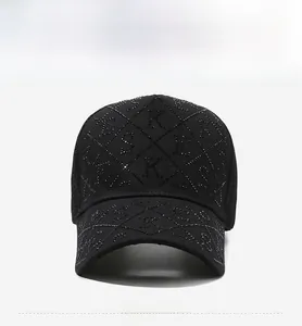 Detailed front view of black baseball cap with rhinestone lattice and decorative letters