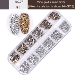 Detailed view of 12-grid box with 1440 flatback AB rhinestones in gold and silver