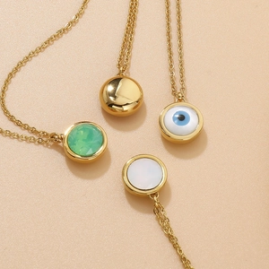 Collection of four 18k gold plated stainless steel evil eye and gemstone necklaces