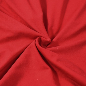 Macro shot of soft red knitted fabric texture with elegant drape for square neck tank top