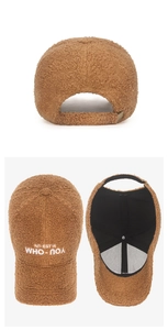 Close-up of brown faux shearling baseball cap showing soft texture and fine stitching
