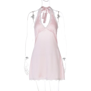 Close-up of pink satin halter mini dress with white lace hem and plunging V-neckline detail