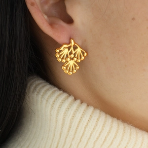 Exquisite golden pine branch stud earrings with small beads in minimalist radial design