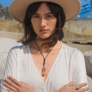 Handmade Seven Chakra stone necklace with a resin rectangle pendant on a black cord