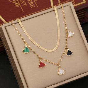 Double-layered gold necklace featuring colorful fan-shaped charms on a sleek snake chain