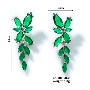 Detailed view of peridot flower earrings with size dimensions 3.0cm by 1.0cm