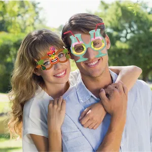Hawaiian party glasses featuring Tiki mask and tropical cocktail designs for beach events