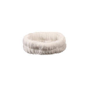 Close-up of a white thickened coral fleece headband showing soft plush texture for face washing