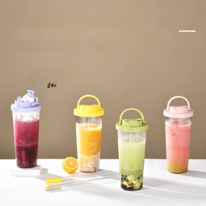 Set of four colorful 880ml Tritan boba tumblers with carrying handles and wide straws