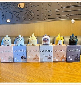 Detailed set of six resin cat figurines with wood-carved style in individual square boxes