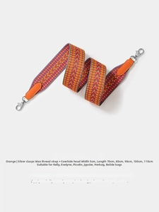 Detail of orange woven 5cm shoulder strap with genuine leather and silver metal clips
