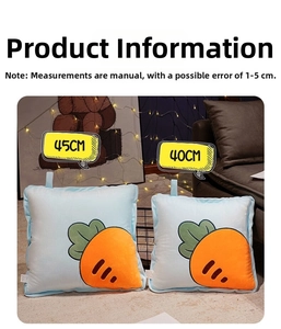 Detail showing two light blue plush cushions with large carrot embroidery in 40cm and 45cm sizes