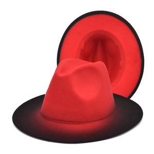 Detail view of the red and black gradient wool felt jazz hat from multiple angles