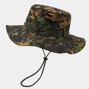 Detail of outdoor boonie hat featuring dry leaf camouflage pattern and adjustable chin strap