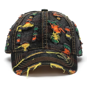 Distressed denim baseball cap with vintage ripped details and colorful interior stitching