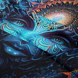 Macro shot of psychedelic mushroom tapestry with detailed blue and orange vibrant printing