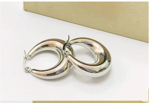 Minimalist thick silver waterdrop hoop earrings in polished stainless steel for women