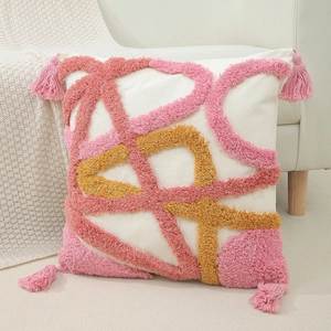 Fodera per cuscino boho con nappe rosa e motivi geometrici per arredo divano