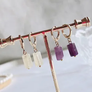 Natural crystal hoop earrings with amethyst and quartz cylinders on gold hangers