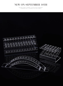 Detailed view of high-transparency acrylic display racks with multi-slot design in various shapes