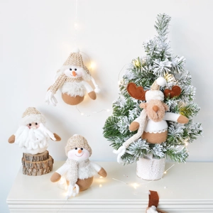 Plush Christmas set with Santa, elk, and snowman on a natural wooden stand