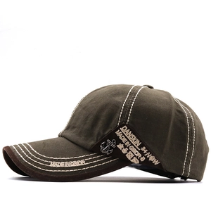 Detail of vintage olive cotton baseball cap with anchor buckle and embroidery