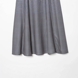 Plaid midi skirt in grey and blue tweed fabric with elegant texture and waist belt