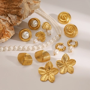 French vintage style pearl jewelry set including gold flower earrings and layered necklace