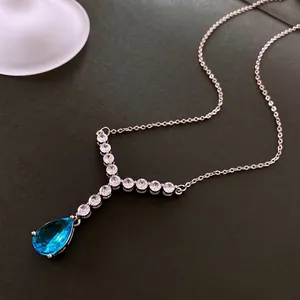 Elegant Y-shaped necklace with a teardrop blue stone and white zircon details