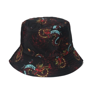 Reversible bucket hat featuring Chinese dragon print in red and blue on black twill fabric