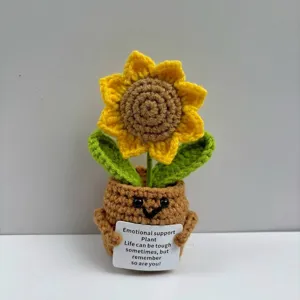 Detailed view of handmade crochet sunflower plant with emotional support card and cute face