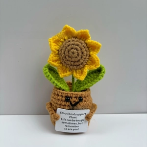 Detailed view of handmade crochet sunflower plant with emotional support card and cute face