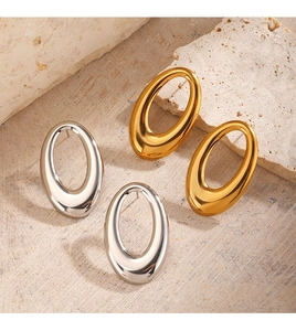 Chic oval hollow hoop earrings in gold and silver finish on textured stone