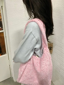 Pink leopard print plush tote bag with soft faux fur texture and checkered lining