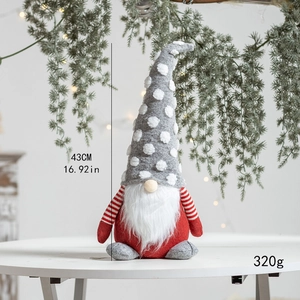 Detail view of a 43cm tall Christmas gnome doll with dimensions and weight info