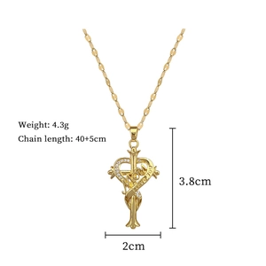 Detail of MOM heart cross necklace with 40+5cm chain length and 3.8cm pendant dimensions