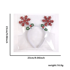 Detailed view of white Christmas headband with red snowflakes and green bow including dimensions