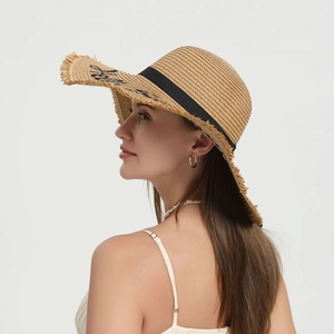 Women's khaki straw sun hat with black ribbon and artistic brim lettering