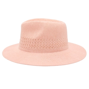 Close-up of pink Panama hat featuring breathable hollow-out knitting and wide brim