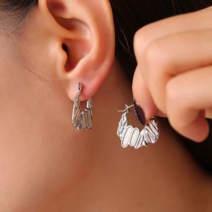 Irregular silver textured earrings with white mother of pearl inlay for women