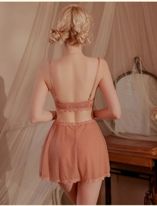 Detailed back view of pink lace lingerie set featuring delicate mesh and embroidery