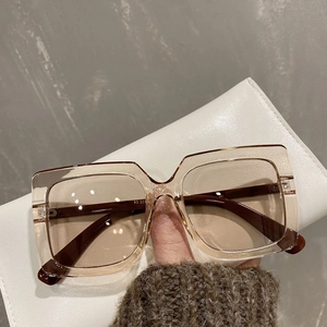 Classic oversized square sunglasses in amber tortoise shell with gradient brown lenses