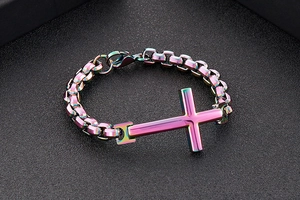 Macro shot of rainbow-plated stainless steel cross bracelet with chunky metal chain