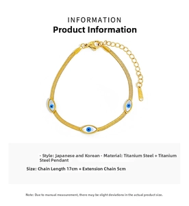 Detailed macro of gold snake chain bracelet featuring three blue evil eye charms and clasp